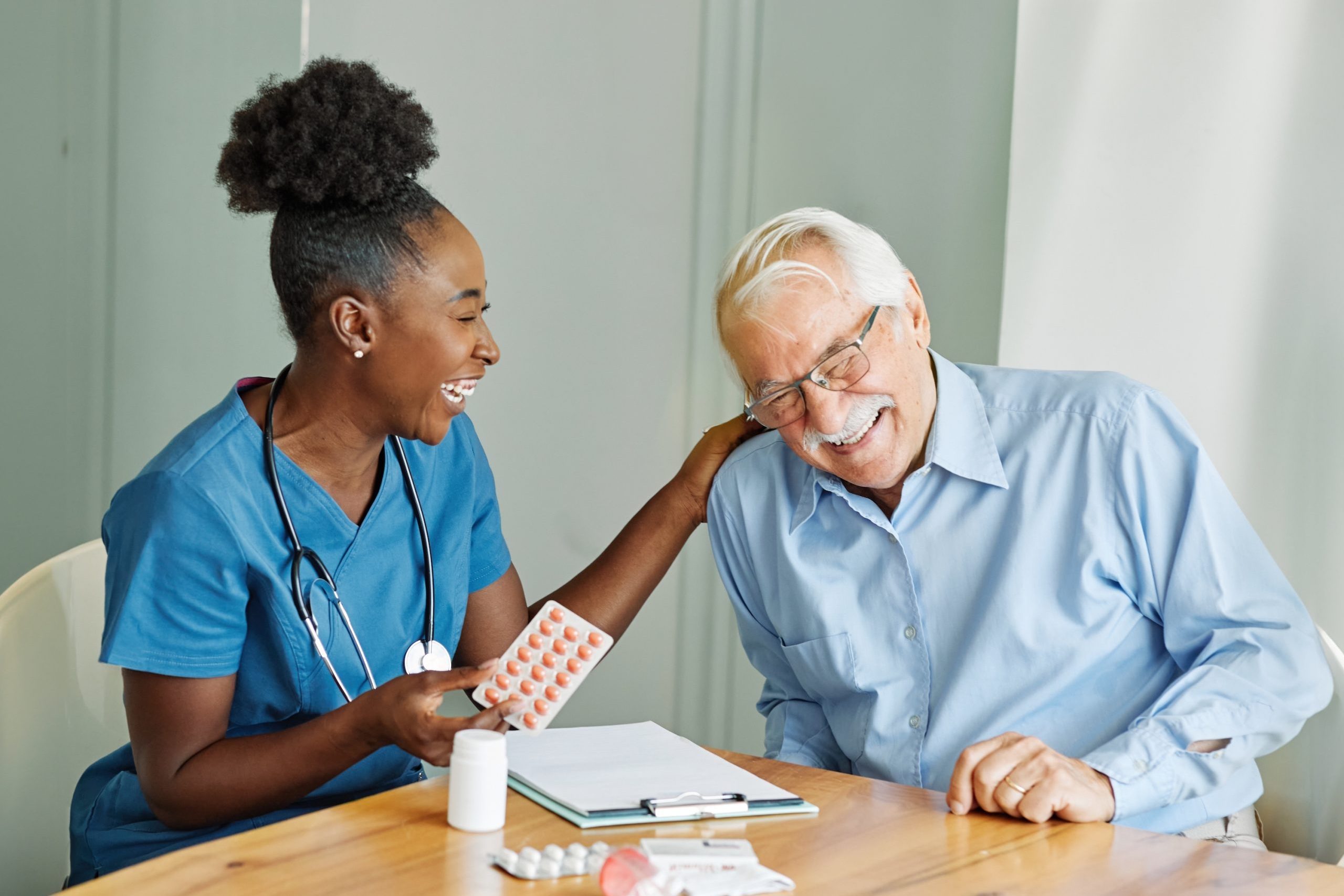 Doctor,Or,Nurse,Caregiver,Showing,A,Prescrption,Or,Documents,And